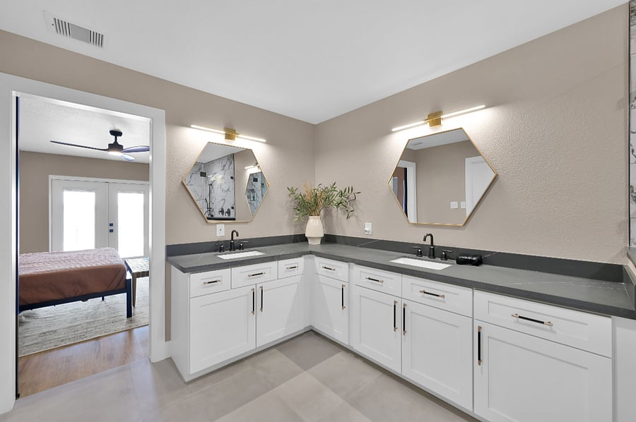 Dual sinks and tons of storage in the primary bathroom.