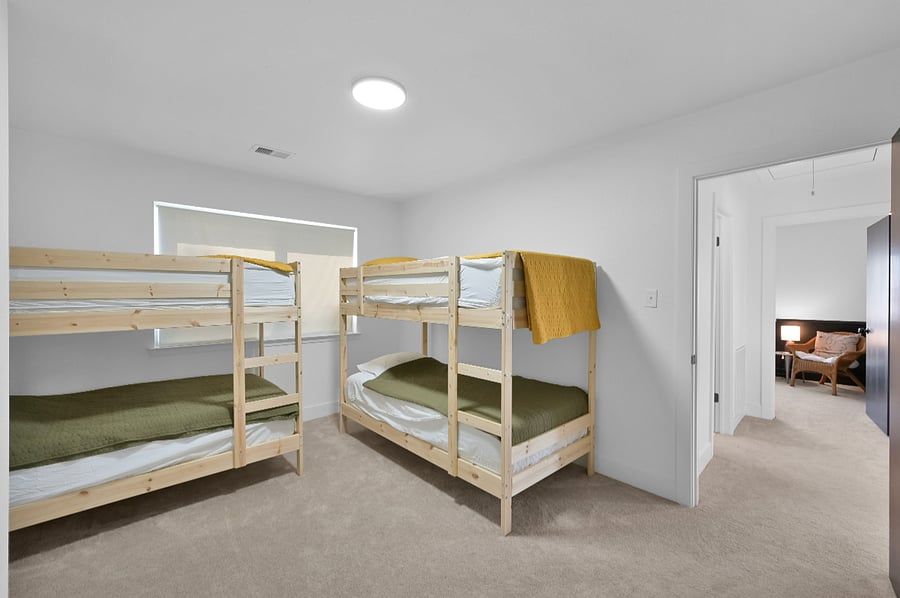 The bunk room upstairs sleeps 4 people.