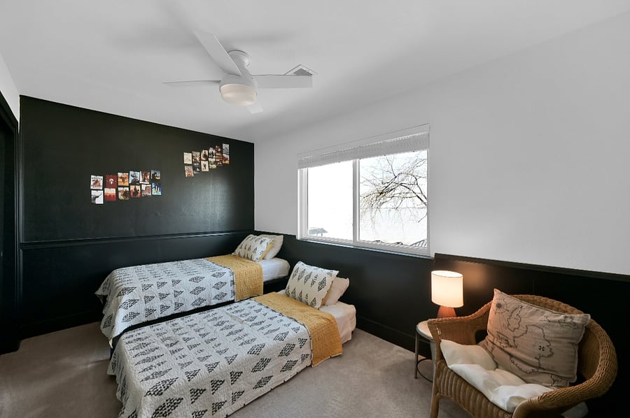 This secondary bedroom upstairs has a twin over twin pop-up trundle and a view of the lake.