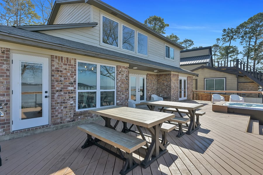 The deck has plenty of seating for big meals outdoors.