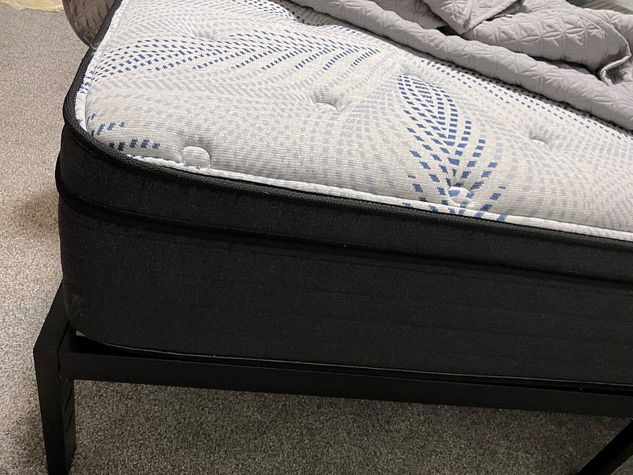 Plush mattress in old fashioned room and in craftsman room. 