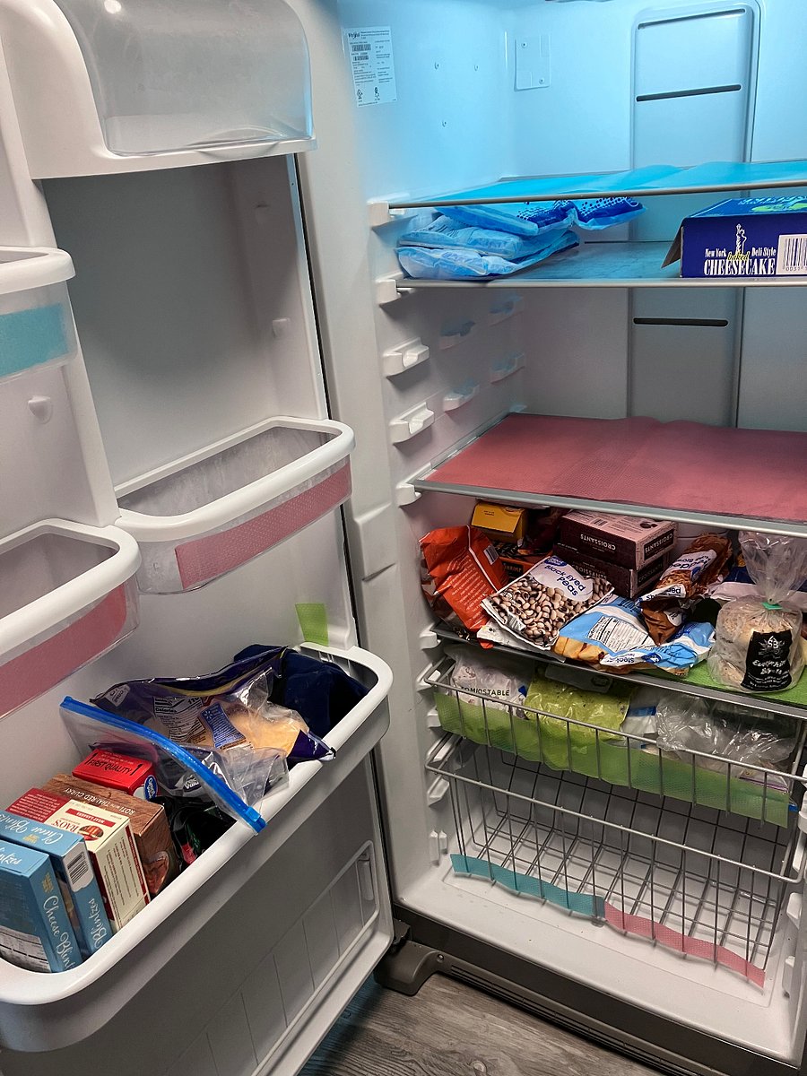 Spacious freezer space divided by room.