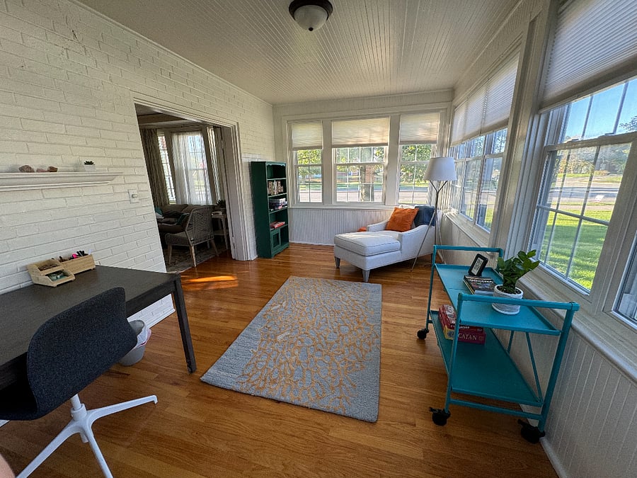 Sun porch off the living room (with french doors)