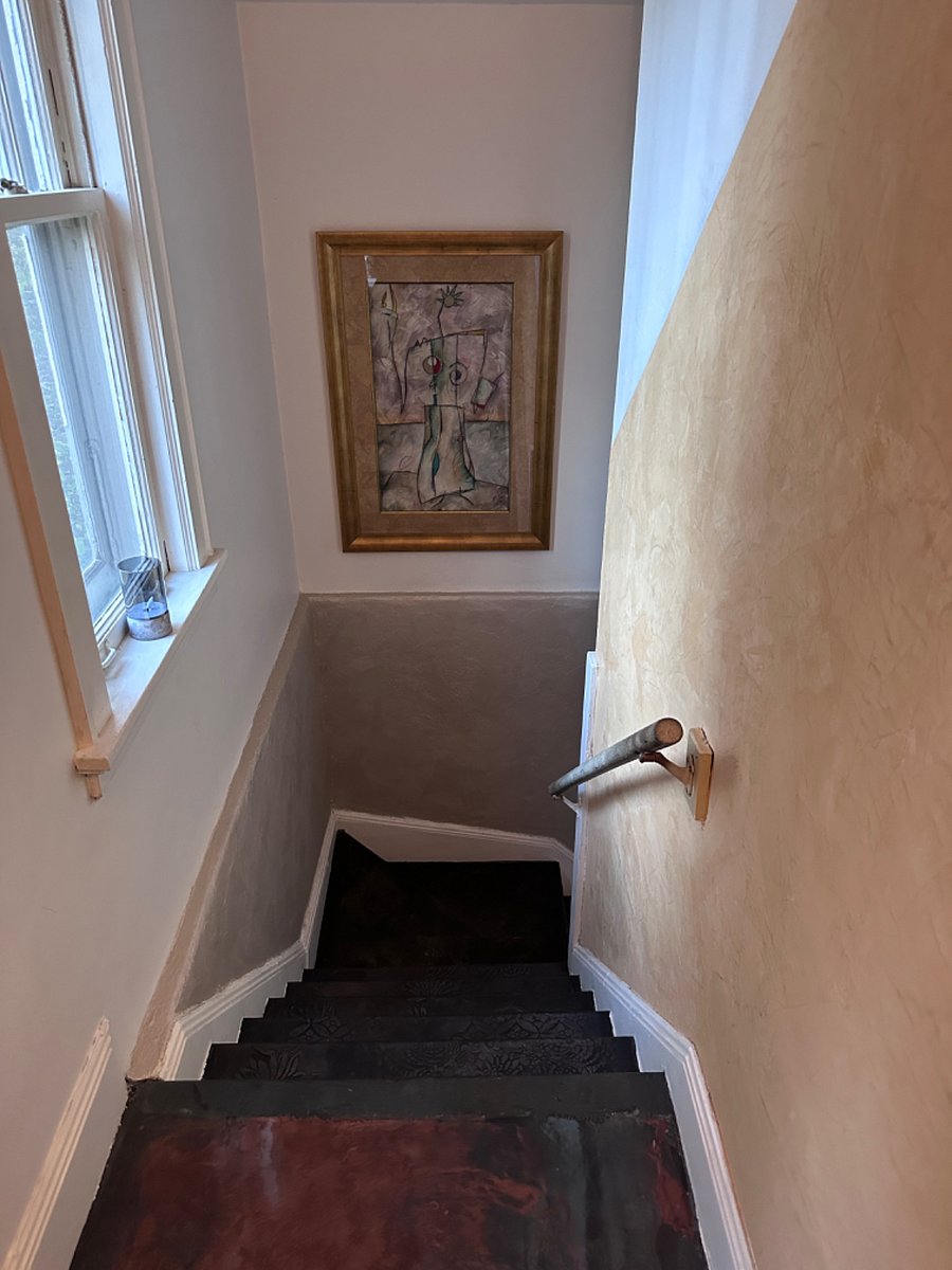 Stairs that lead to upstairs living area.