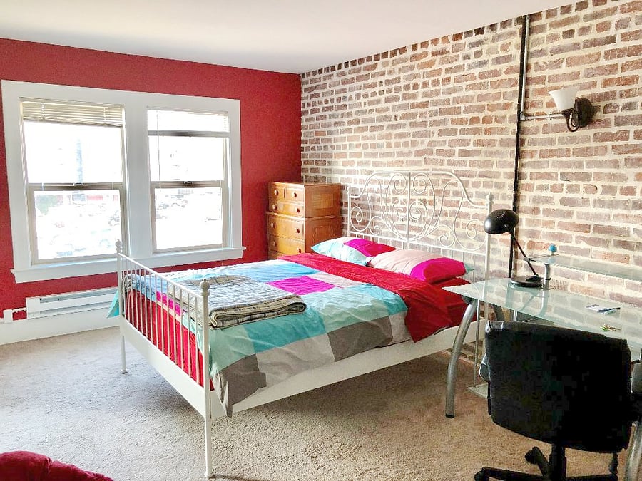 large warm and rustic studio on a quiet top floor corner.