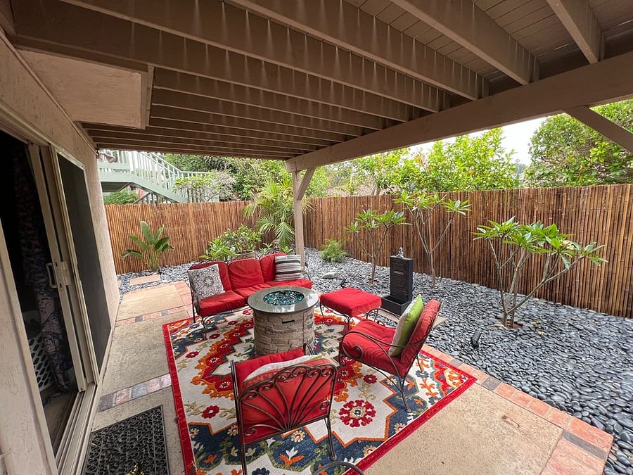 Downstairs "ZEN" garden with Fire pit and fountain. Very tropical.