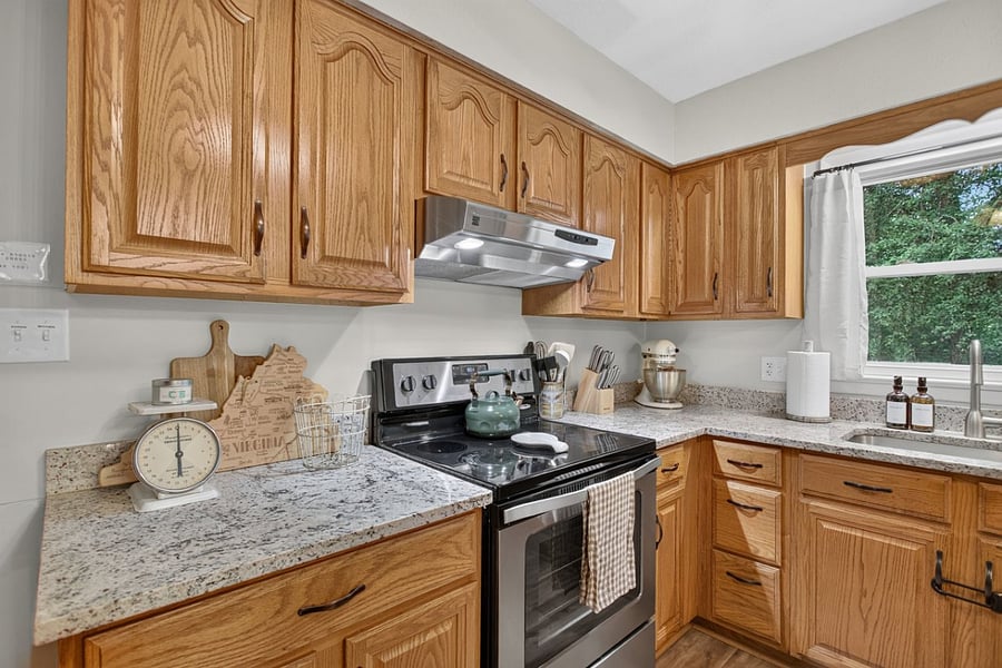 Full-size appliances, dishwasher, plenty of counter space and a well-stocked kitchen for everyday living.