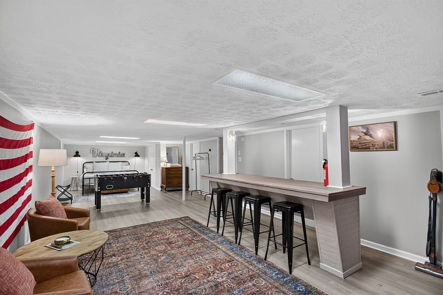 Additional lower-level sleeping space provides even more flexibility for families and longer stays.