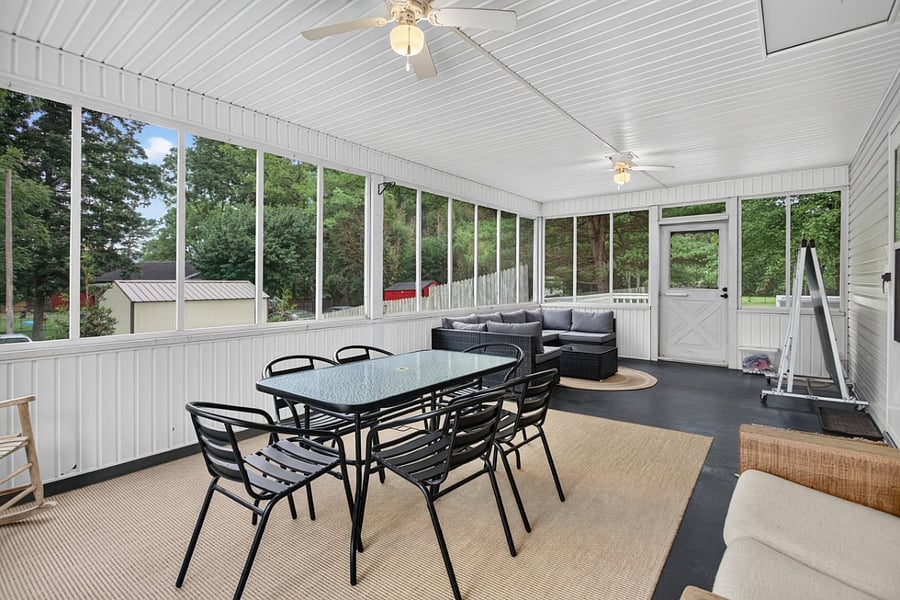 One of our favorite spaces in the house  a huge screened porch with dining and lounge areas for enjoying the Shenandoah Valley seasons. Ping pong table included. Can be set up on the porch or pushed out to the patio. Fun regardless of the weather/season!