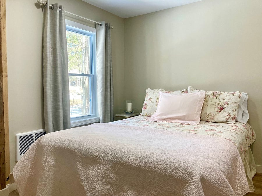 First floor bedroom with queen size bed closet and electric heater.Bathroom