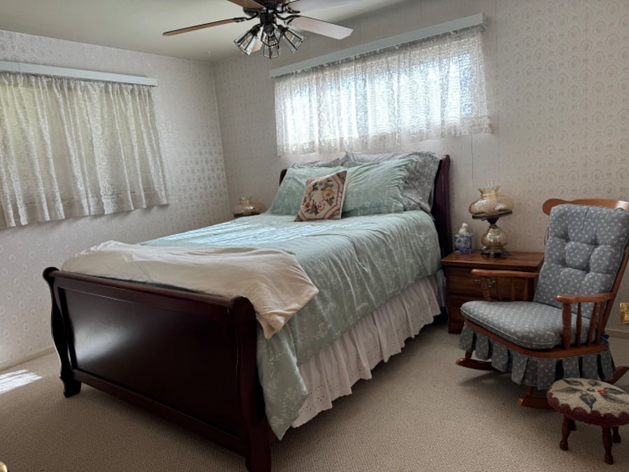 Large bedroom with lots of natural light.