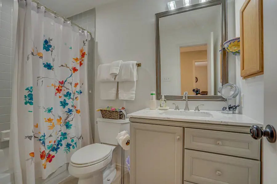 The hall bathroom offers a shower/tub combo and easy access to the two guest bedrooms.
