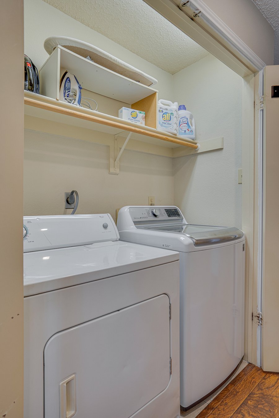 A full size washer and dryer with Free and Clear Detergent and dryer sheets provided