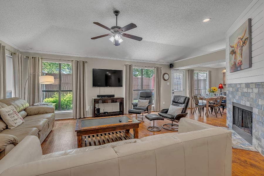 The living room has an open concept with the dining area and kitchen.