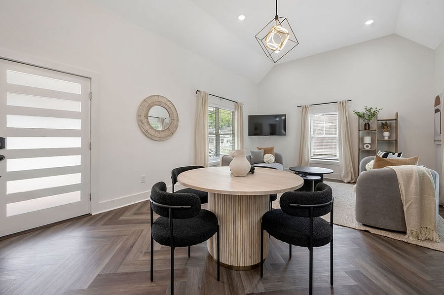 The dining room offers a refined space with seamless access to the kitchen and open living area