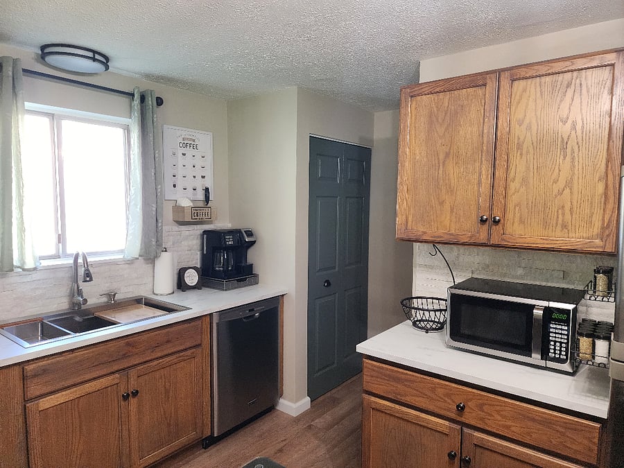 Kitchen + pantry (basement door across from pantry)