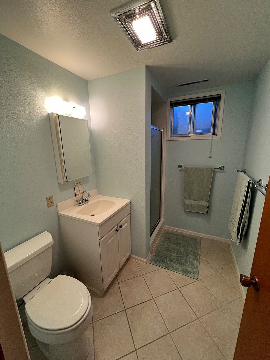 Your private bathroom with access to tub upstairs in guest bath and outdoor shower in the warmer seasons