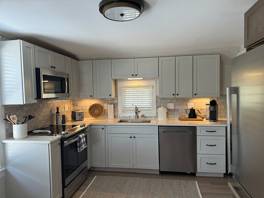 Full Kitchen with stainless appliances, granite counters, and full amenities