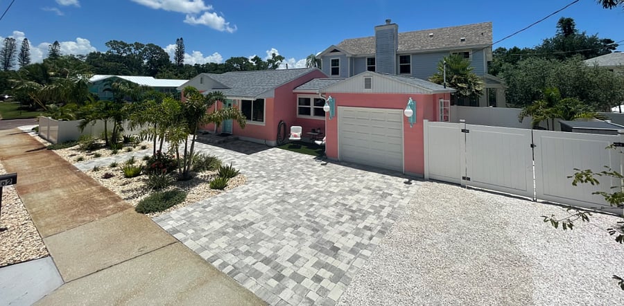New pavers and shell landscaping offer lots of parking choices. All new landscaping and fencing.
