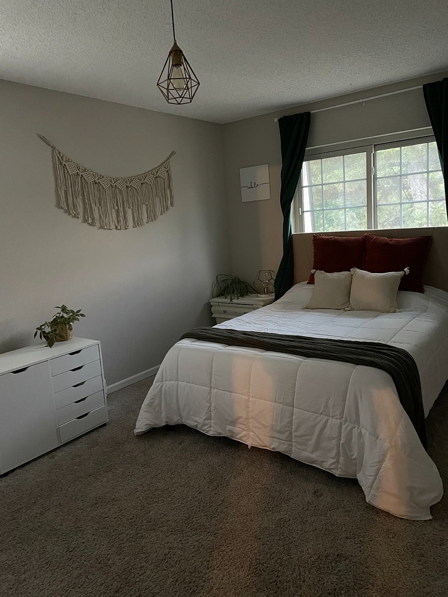 First bedroom- fully furnished with queen bed, night stands, and large closet