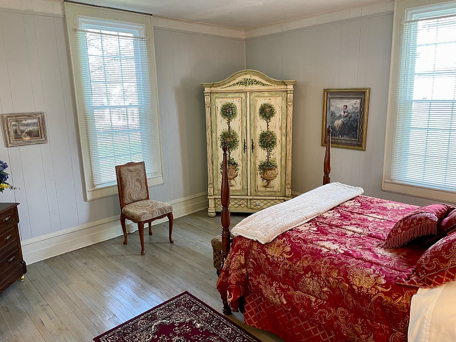 Back bedroom and armoire 