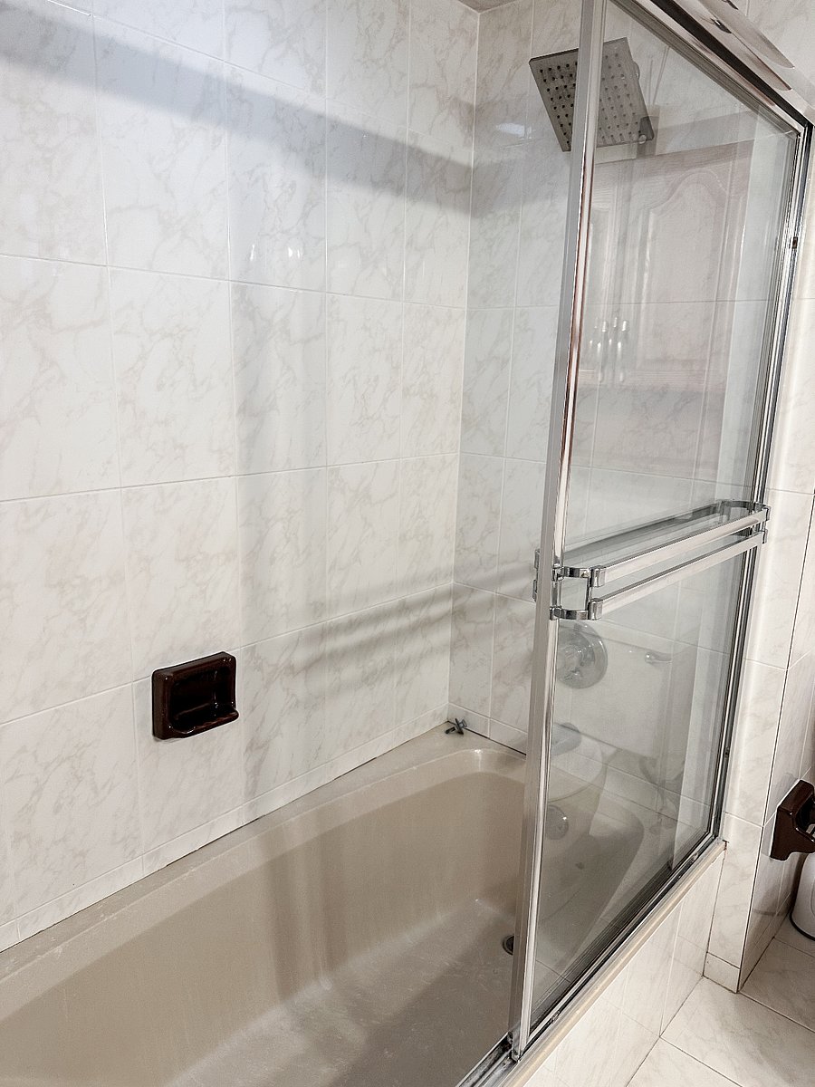 Personal full size bathroom with shower, bathtub and bidet