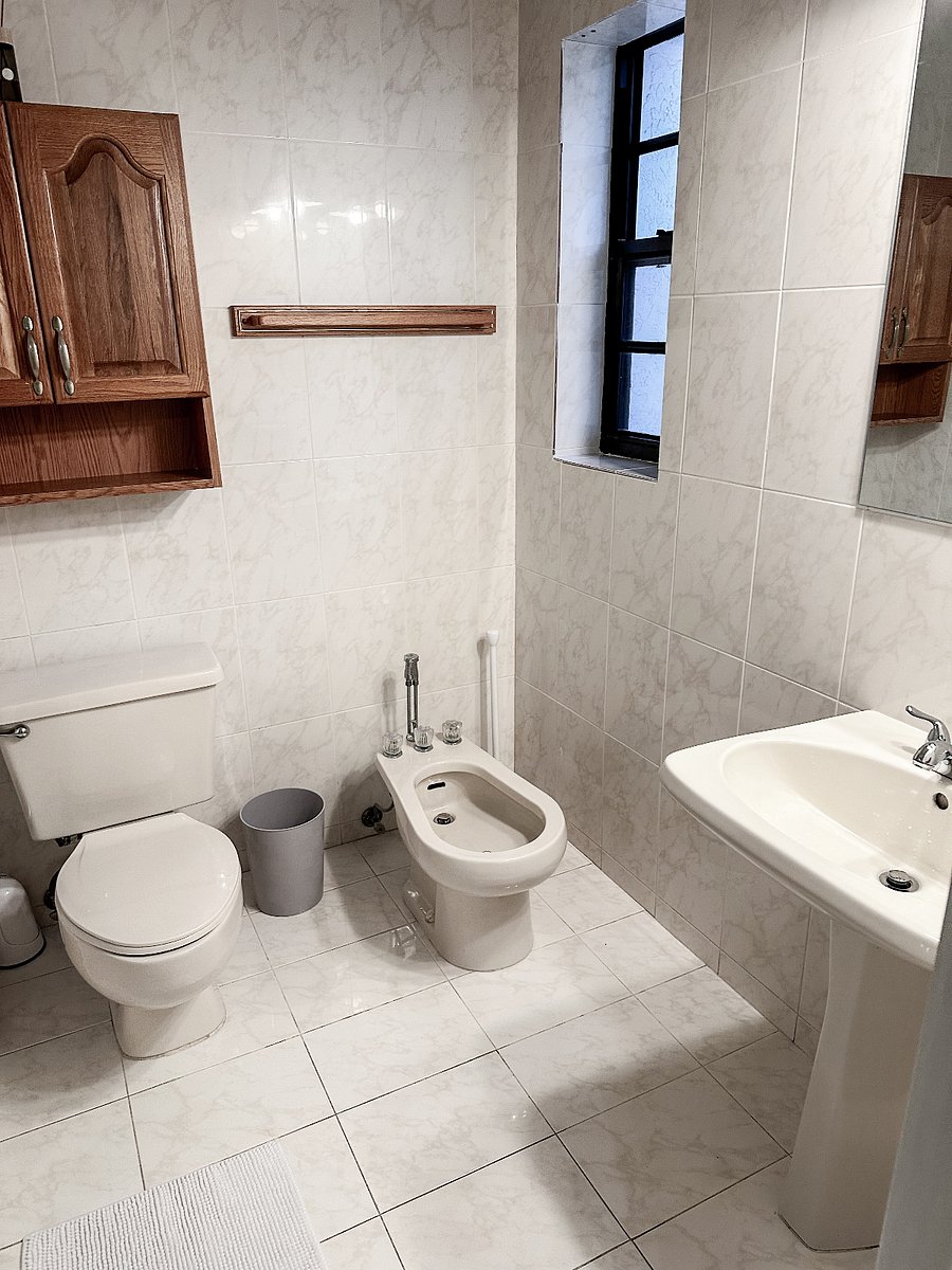Personal full size bathroom with shower, bathtub and bidet