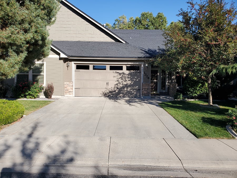 Curbside view of house and garage where you will be keeping your vehicle.