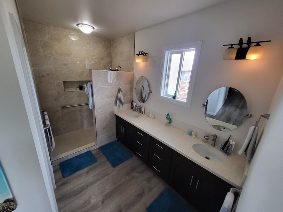 Master bath with walk-in shower and handrails