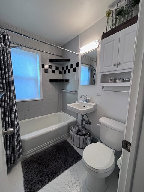 Bathroom with full size soaking tub and shower