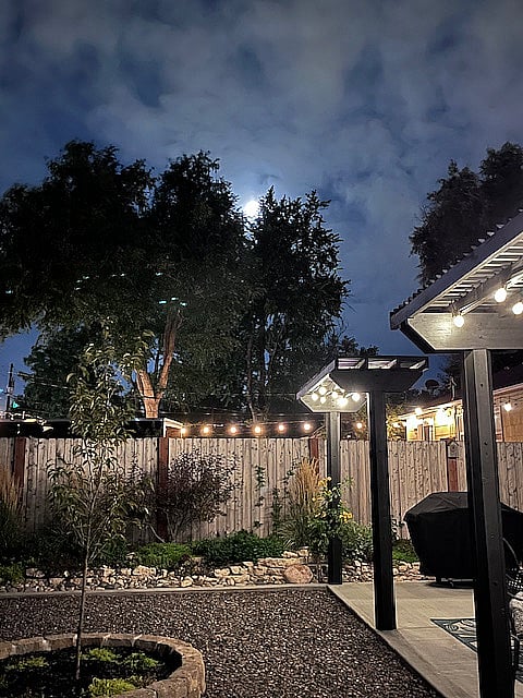 Solar string lights on backyard patio