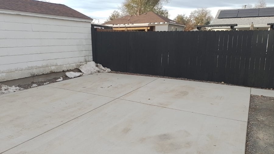 Large 2 car parking pad off the alley with access to the house through the backyard gate