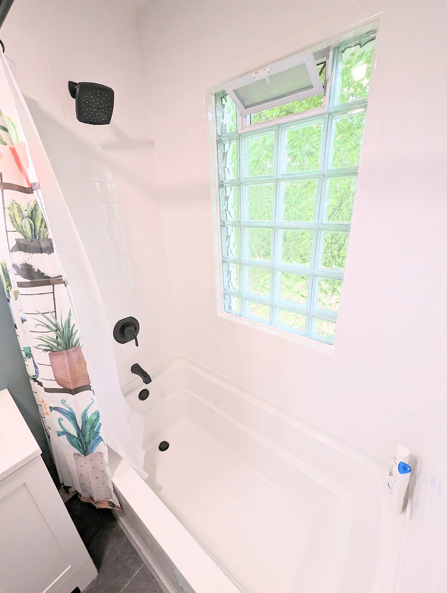 Full Bathroom with Soaking Tub and Shower