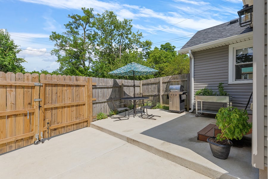 Fenced-in backyard & patio to include propane grill