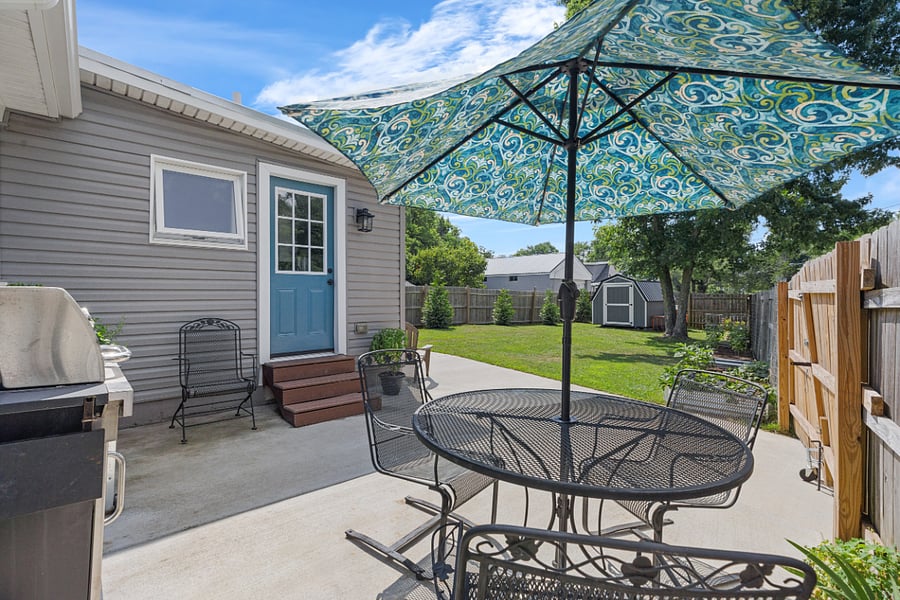 Fenced-in backyard & patio to include propane grill