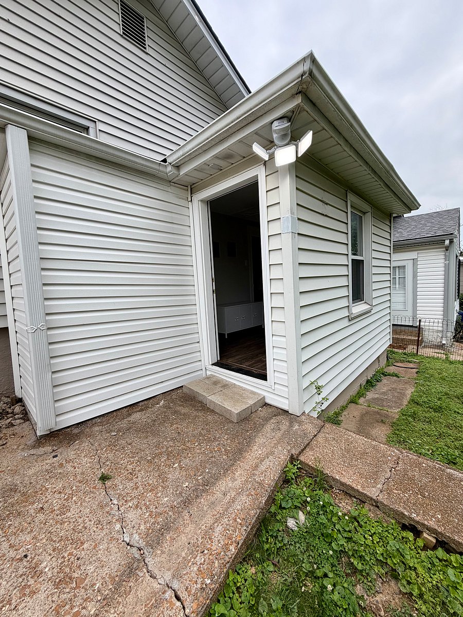 Access to completely fenced in back yard from the office. 