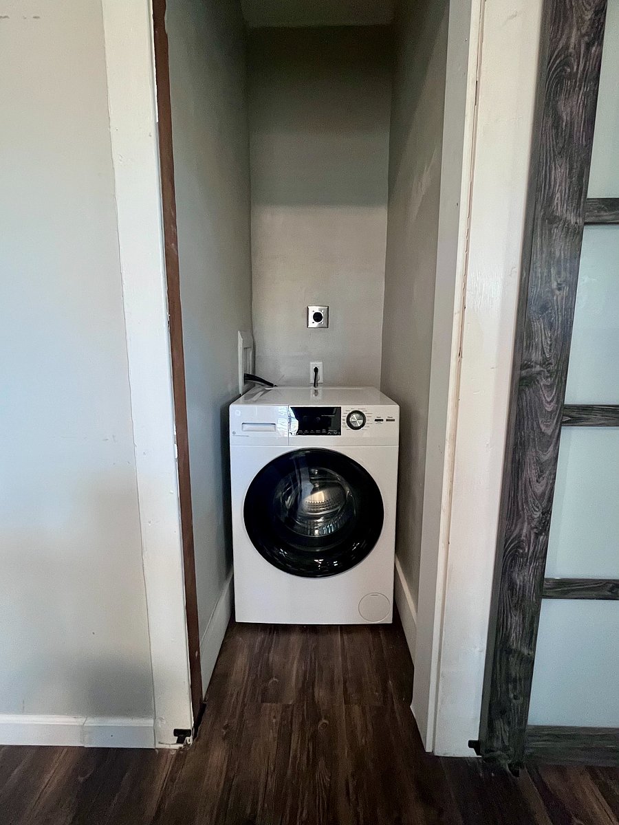 All in one washer and dryer on main level for convenience and easy access.
