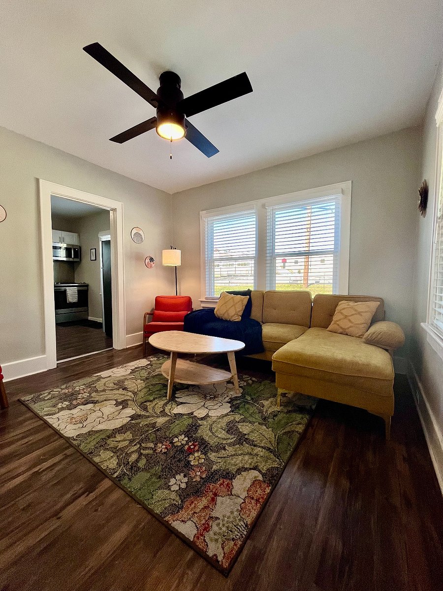 Living area with ample amount of natural light and seating