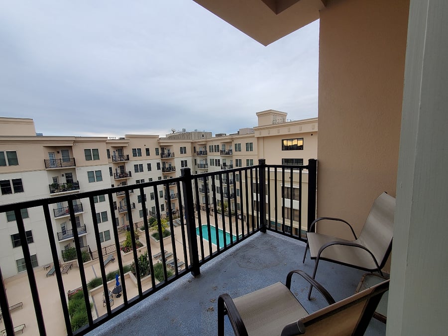 Balcony overlooking pool.