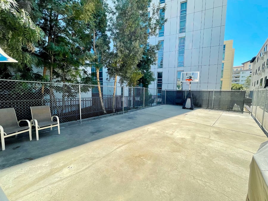 Basketball court next to the terrace.
