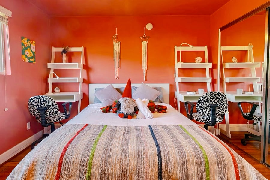 Bedroom - queen bed & twin desks.