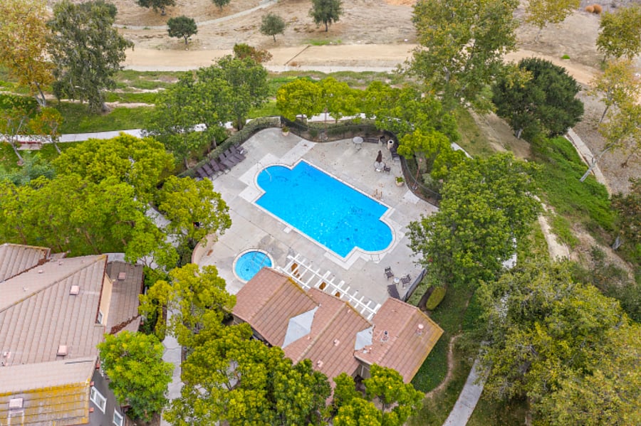 Community pool is steps away