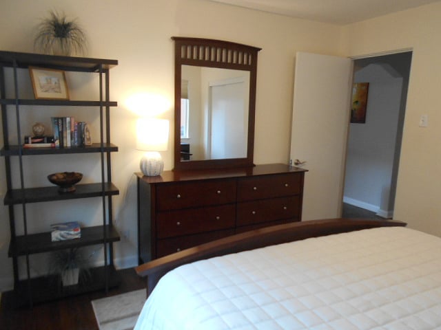 Full sized chest of drawers, and a night stand.