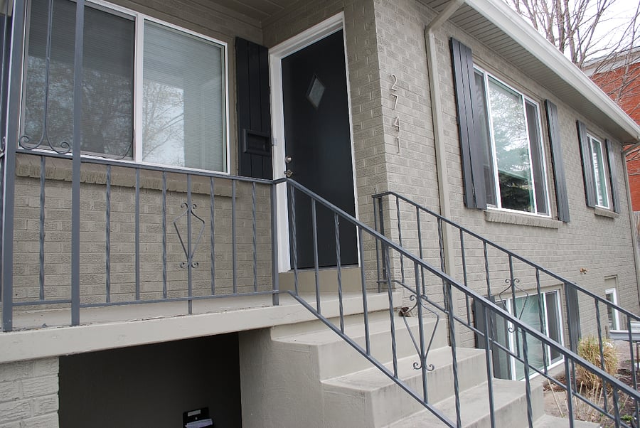 Private entrance into the upper-level unit.  This is 950sf with hardwood flooring throughout.  
