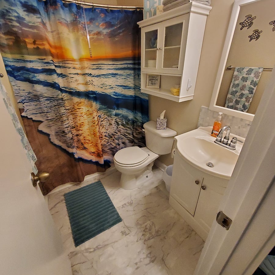 Hall bath has sink and tub/shower. Convenient to living space, Queen and Twin bedrooms.