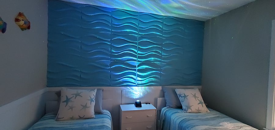 Stare up at the night sky with an aurora borealis light. Even when this room is not actually used for sleeping, it's a great place to relax or meditate.