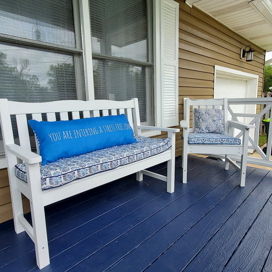 Rocking chair front porch with bench, two chairs and rocker. Great place to ease into your morning or relax with a good read on that cherished afternoon off.