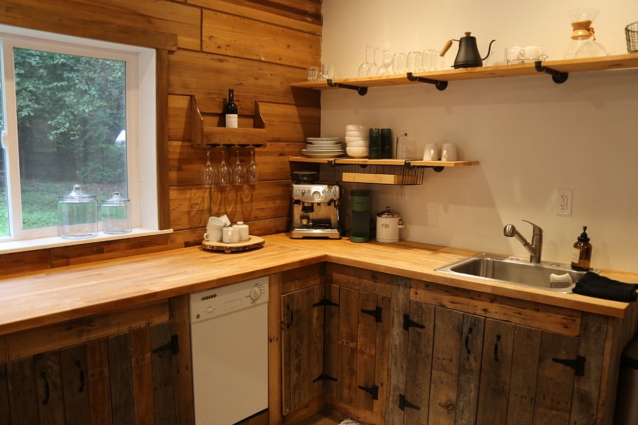 Fully stocked kitchen, including air fryer, large toaster oven, electric burner + pots and pans, microwave, blender, and more. (Please note- pictured espresso machine has been replaced by a Keurig).
