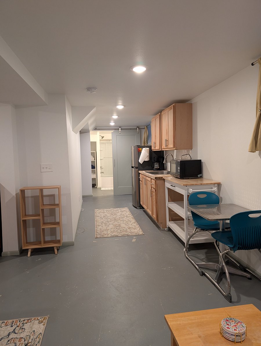View from couch toward kitchen and bath.