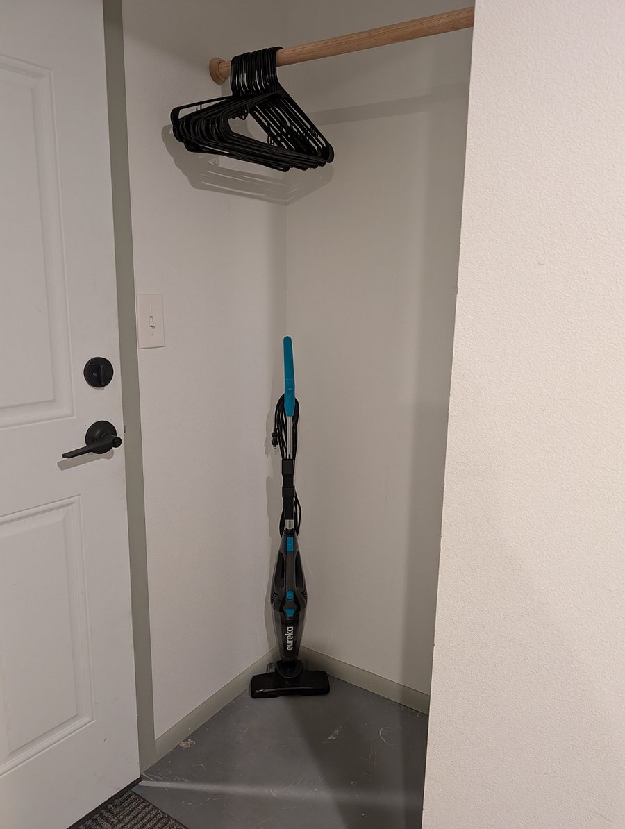 Closet and vacuum.